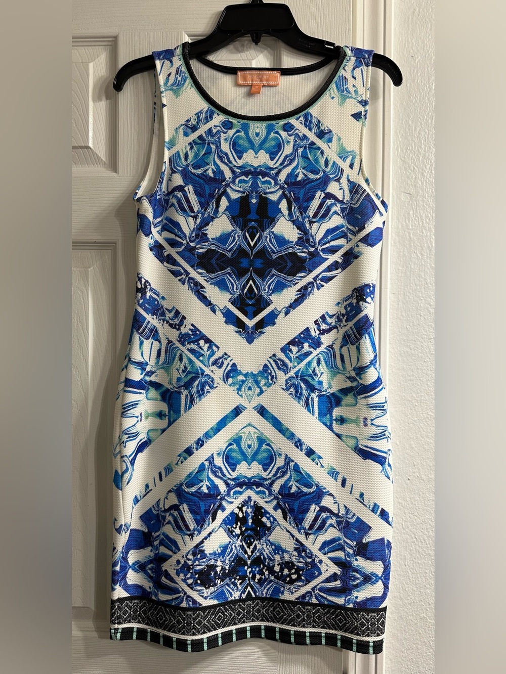 Blue & White Printed Sleeveless Mini Dress by Peachpuff